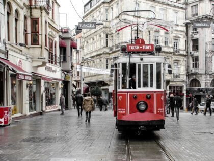 the old tram and people walking in Taksim - Dmitry V. Petrenko